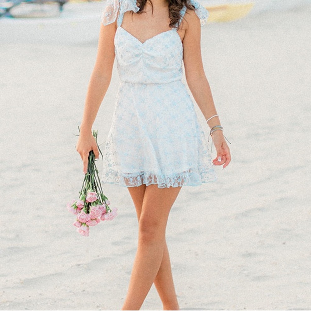 Lucy in the sky dress work once for senior photos still in brand new condition!